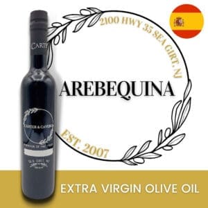 Bottle of Carter & Cavero olive oil with "Arebequina" text, Spanish flag